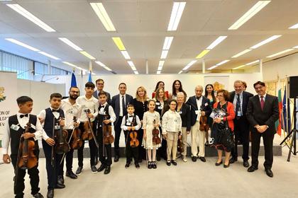 With concert performances in the Palace of Nations and in the premises of the International Labour Organization, the Sliven Children's Symphony Orchestra from Bulgaria made its debut in Geneva under the direction of the Bulgarian violinist Georgi Kalaidzhiev
